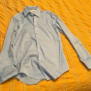 Calvin Klein Dress Shirt. Light blue. Slim fit stretch. 14-14.5 32/33. Small